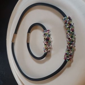 Pretty black rubber band beaded necklace and bracelet set.